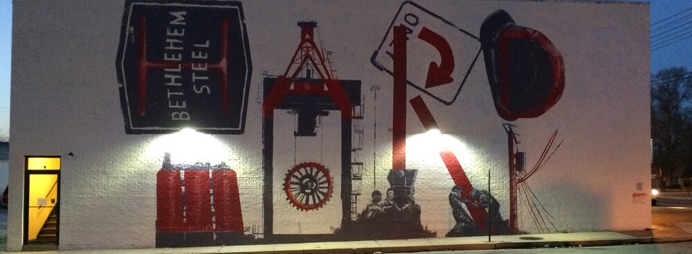 mural of steel workers and equipment