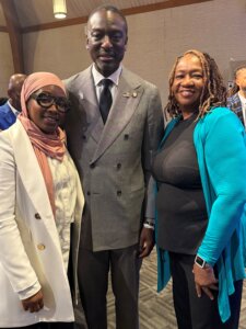 Dr. Yusef Salaam pictured in the center, his wife to his left and BGL legal assistant LaClaudia Dyson is on the right.