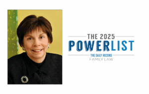 Head shot of Dana McKee smiling with The Daily Record type treatment logo for their 2025 Family Law Power List 
