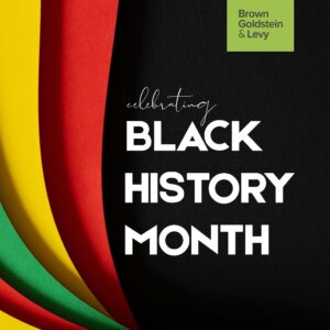The title Black History Month is white on a black background with ribbons of green, yellow and red, the traditional colors that represent Pan-Africanism.